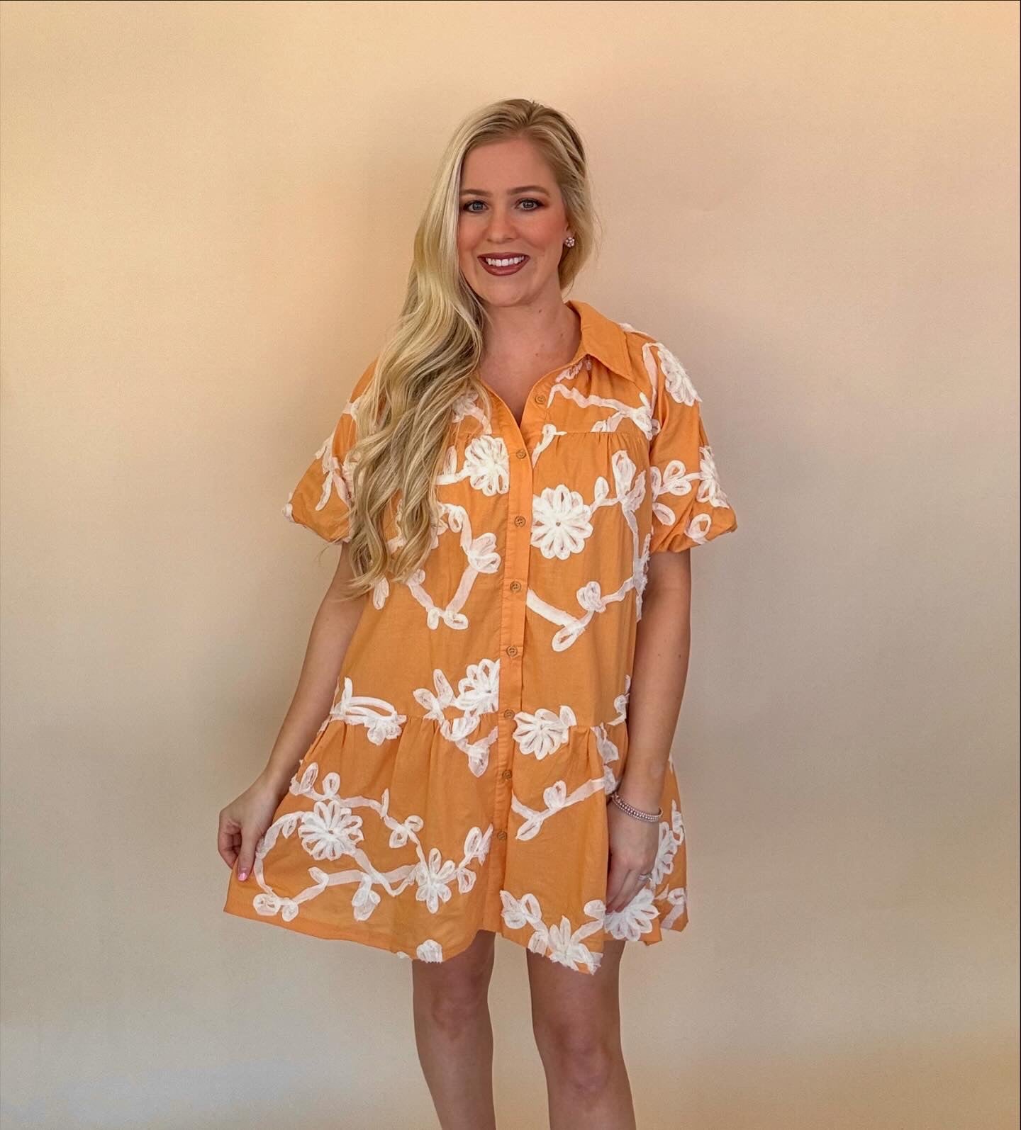 Entro button down dresses with raised detailing