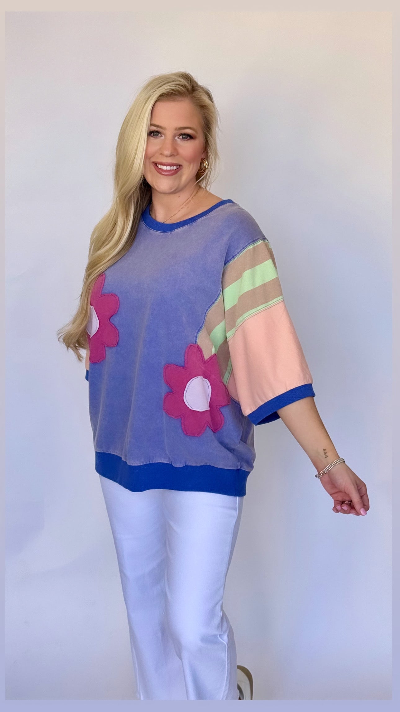 Easel knit color block top with flower patches
