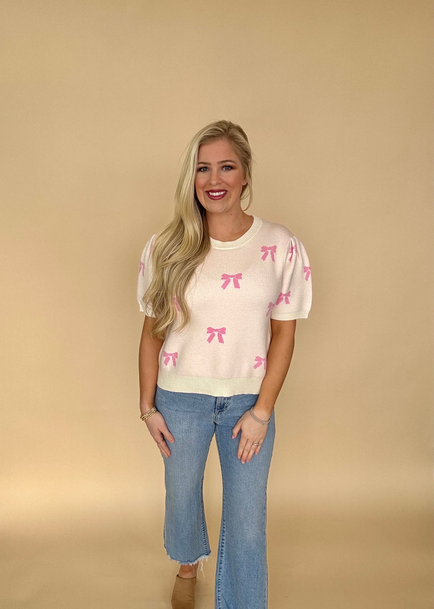 She + Sky off white bow sweater top