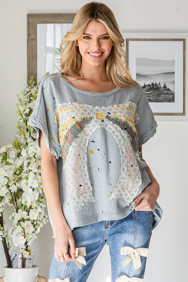 Oli & Hali Paint Splatter Bow Patch top