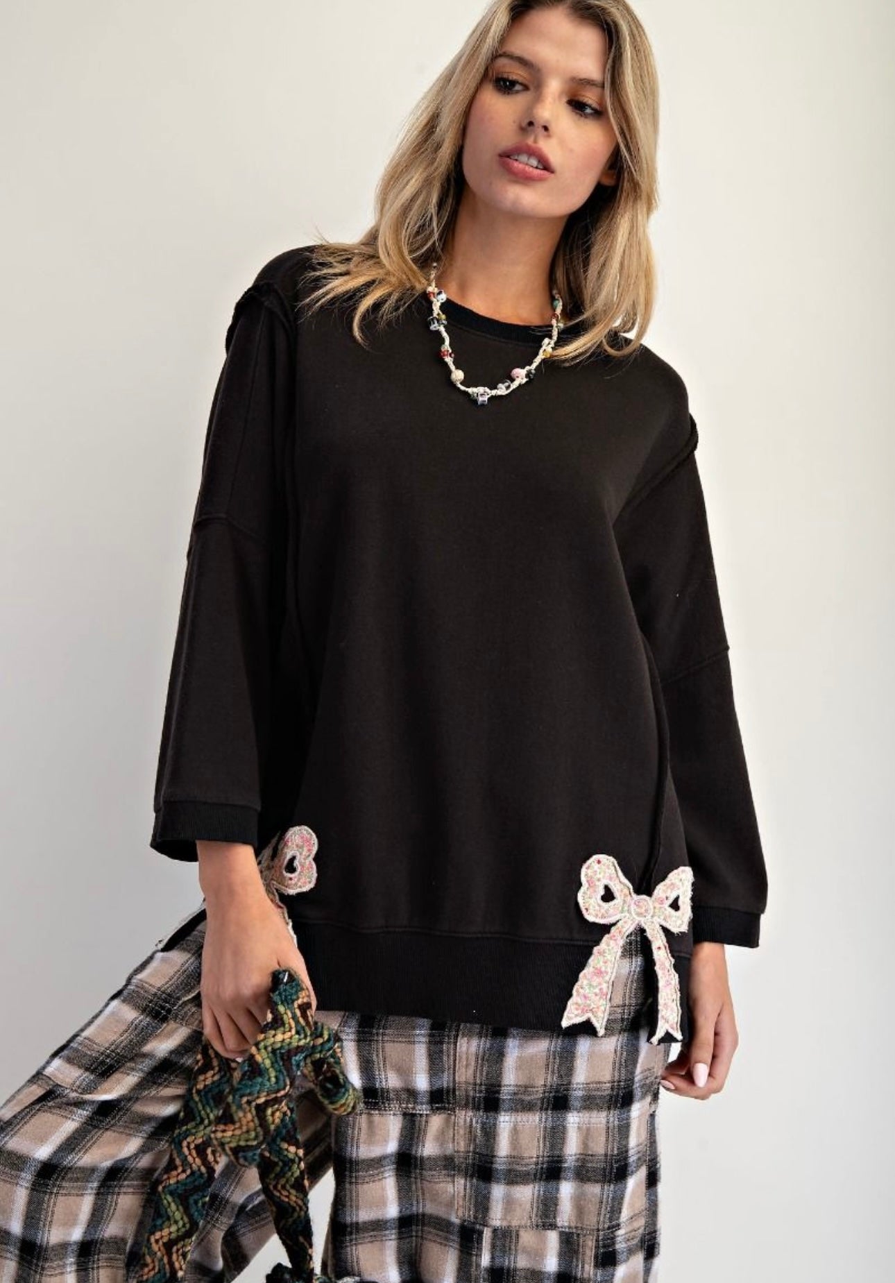 Easel bow patch sweater top