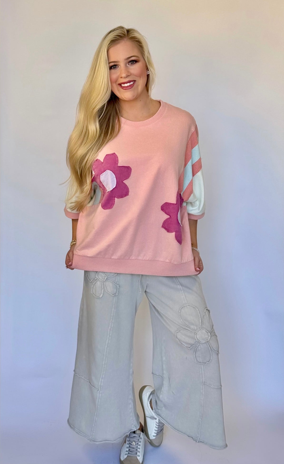 Easel knit color block top with flower patches