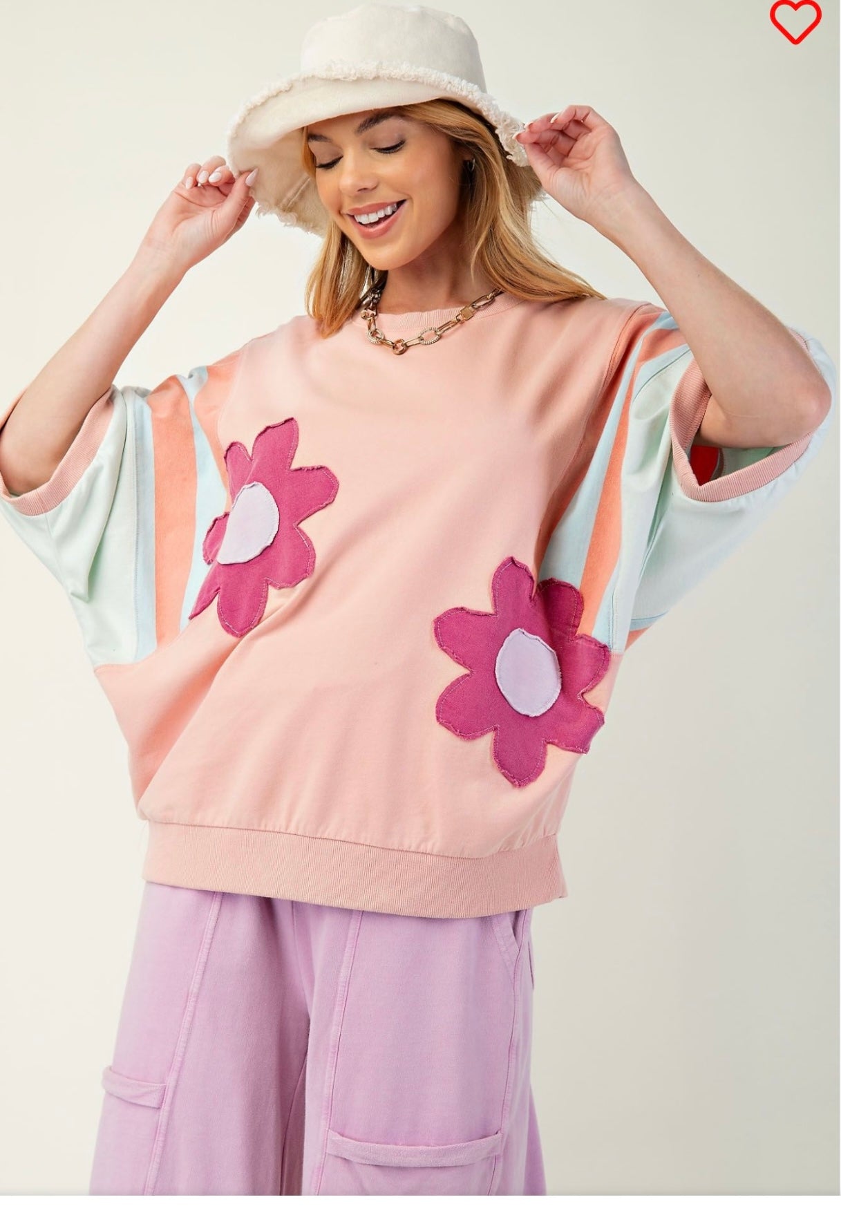 Easel knit color block top with flower patches