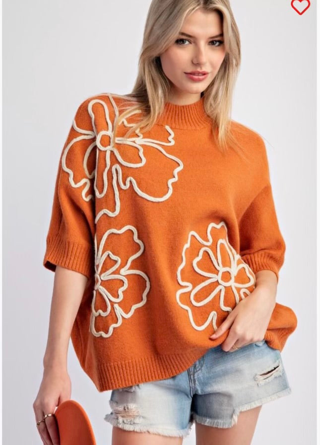 Easel stitched sweater tops