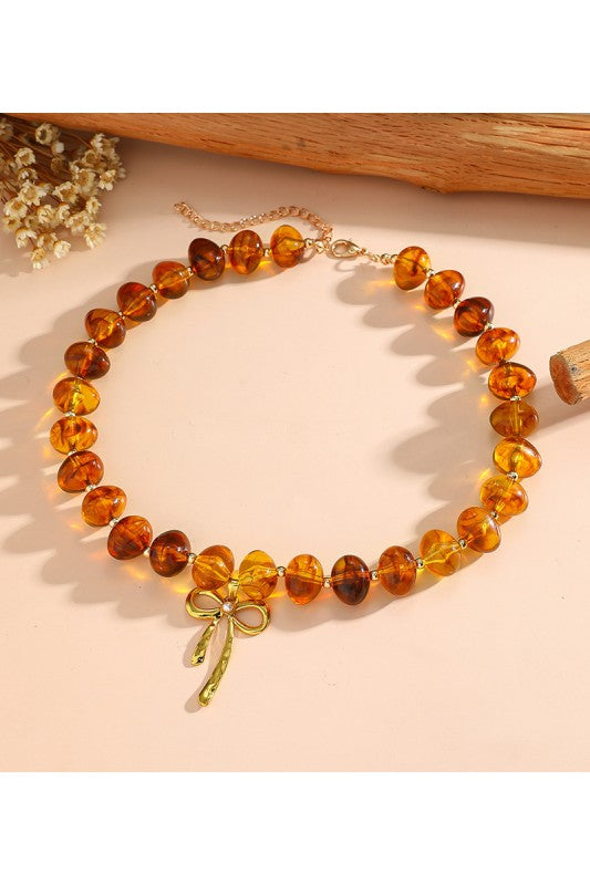 Chunky beaded bow necklaces