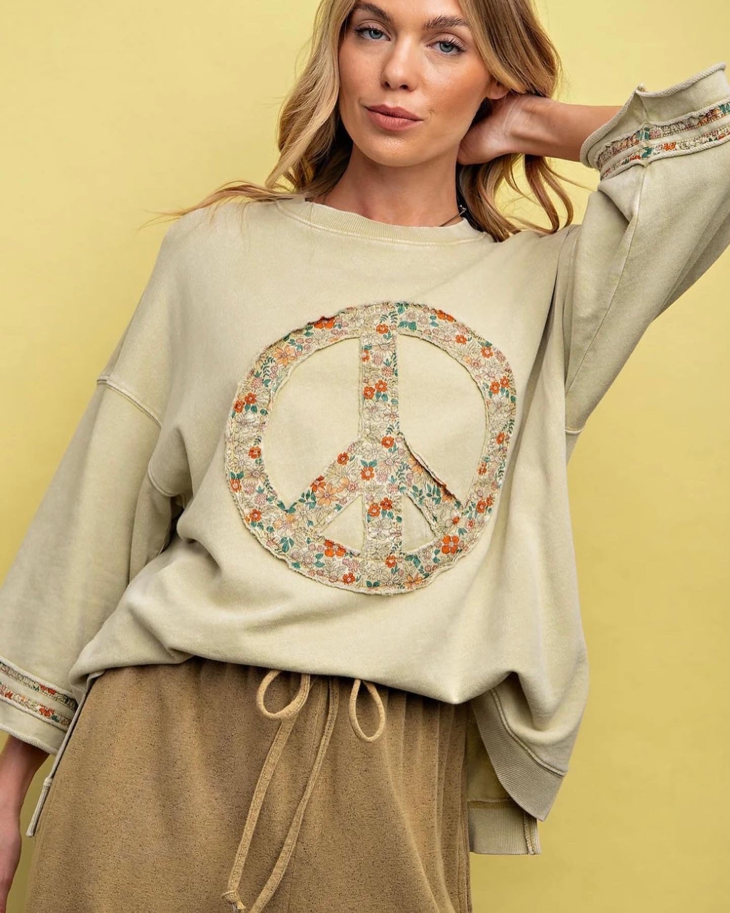 Easel peace sign patched tops